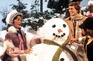 Carpenters-Christmas-Karen-Richard-and-Cubby-with-snowman-color-horizontal-300x198.jpg